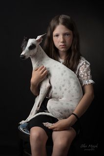 Portrait of a girl with a dog