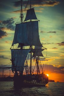 The Frigate Shtandar in calm weather sailing sunset time Riga Latvia