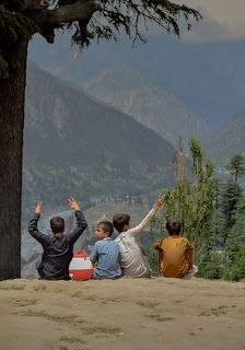 The child in the picture sitting in solitude looking at the beautiful view in front of me and being in thought prompted me to paint it.
The arrival of his friends moments later and the rapid change in the child\'s mood before their presence gave me the opportunity to create this series.