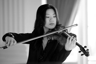 Closeup shot of a violinist during performance