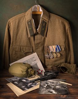 С гимнастеркой и медалями