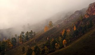 Мне повезло: я видел, как туман накрыл хребет...