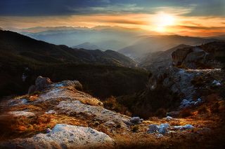 View from the Rhodope Mountains of Bulgaria. In the distance can be seen the peaks of Pirin Mountain.