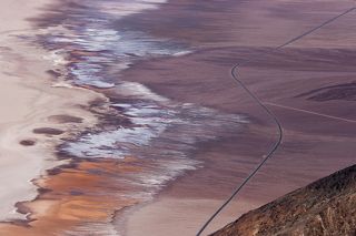 Местность представляет собой бассейн, накапливающий воду из нескольких небольших родников, однако скопление солей в бассейне делает её непригодной для питья — эта особенность и дала название местности Badwater, что дословно означает «плохая вода».