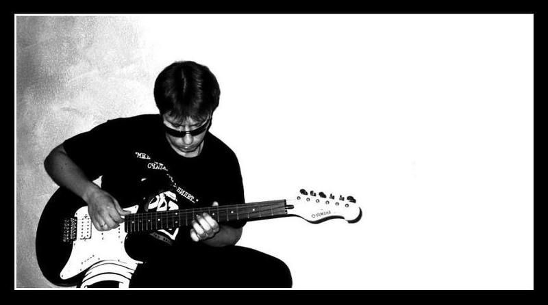 портрет гитаристphoto preview