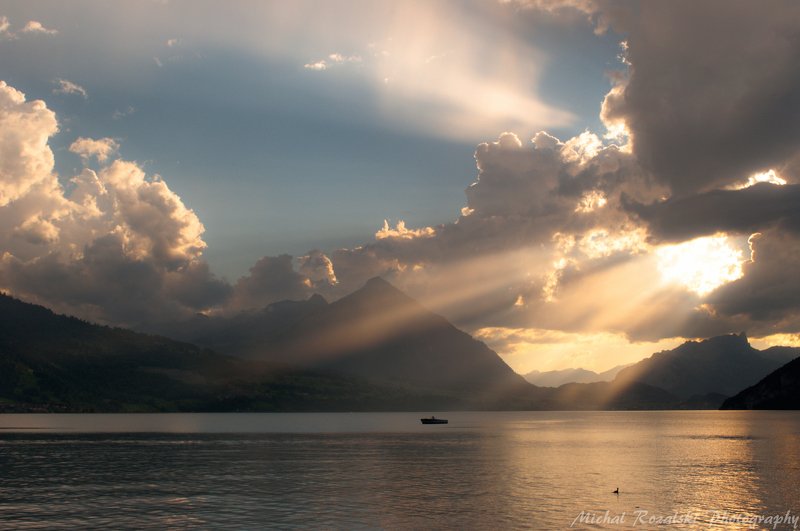 light, ,golden, ,lake, ,sunrays, ,mountains, ,summer, ,boat, ,sunset, ,clouds, ,sky Golden lightphoto preview