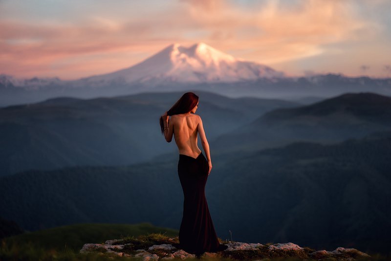 mountain, sunset, landscape, sky, nature, mountains, sunrise, clouds, travel, cloud, blue, silhouette, beautiful, view, sun, peak, evening, hill, rock, hiking, woman, morning, fog, horizon, desert, elbrus, freedom, caucasus, lonely, graceful, sexy, touris bends of mountainsphoto preview