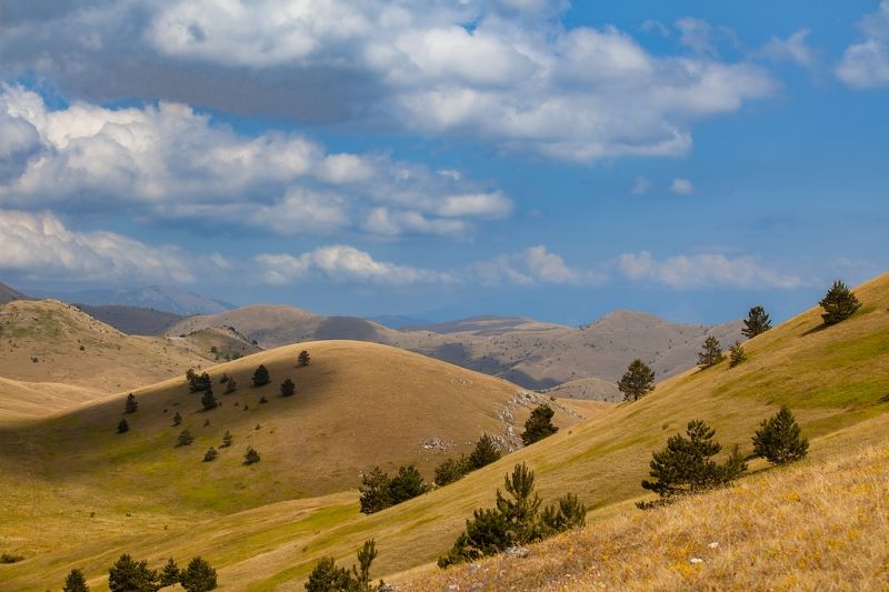 italy, landscape, campo imperatore, abruzzo, sky, clouds, land, trees, yellow, storm,plateau, mountain Campo Imperatorephoto preview