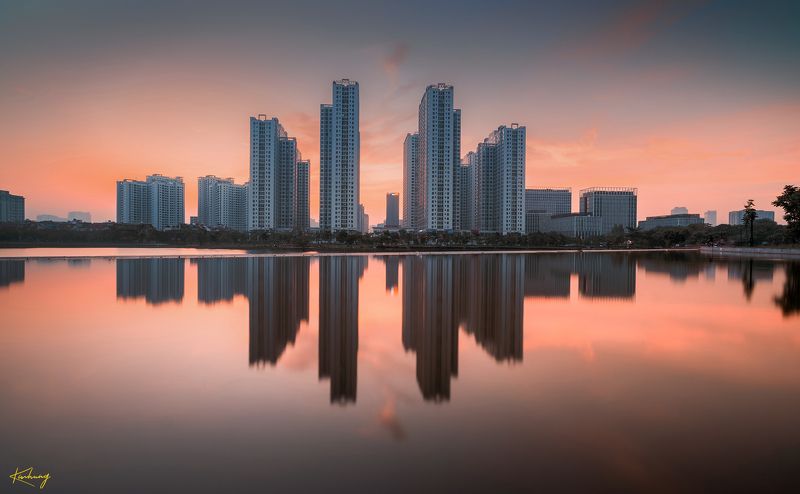 Coral Pink. Sunset building reflections. Hanoiphoto preview