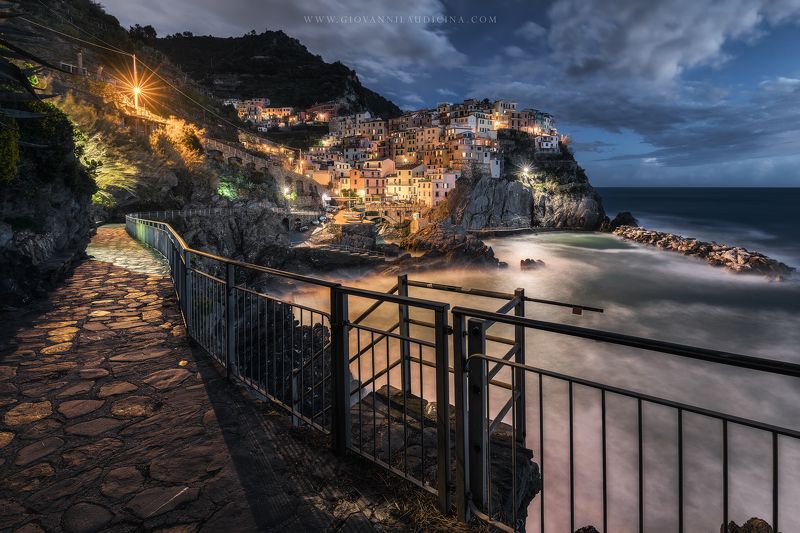 italy, liguria, cinque terre, manarola, la spezia, mediterranean, unesco, village, town, long exposure, night, sea, sky, cloud, light, panorama, coast, landscape, amazing, scenic, travel, destination, nightscape, rock Manarolaphoto preview