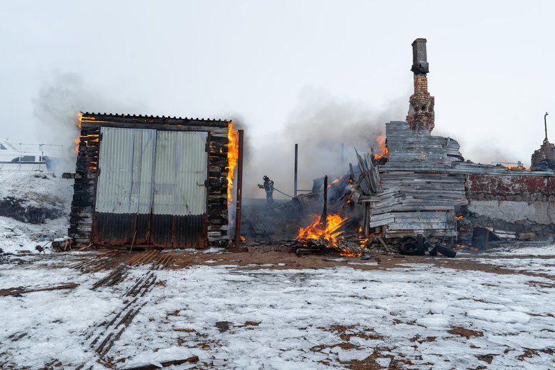 rural; bright; traditional; tree; firewood; bonfire; heat; water; light; orange; equipment; smoke; black; burnt; wood; red; flame; village; cooking; flames; fire; burn; wild; operation; fisherman; fish; environment; outdoor; mediterranean; lifestyle; peop fire in a village in the Arctic circlephoto preview