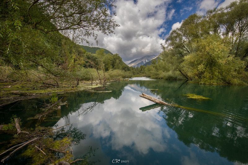 water, lake, landscape, clouds, italy, abruzzo, trees A cloudy dayphoto preview