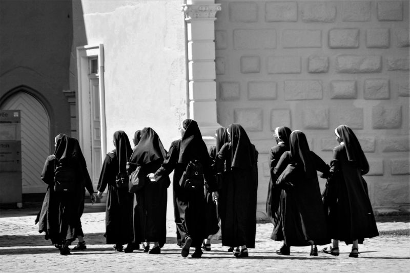 woman, street, city, old, walking, building, people, architecture, urban, walk, town, medieval, guard, couple When the Saints Go Marching Inphoto preview