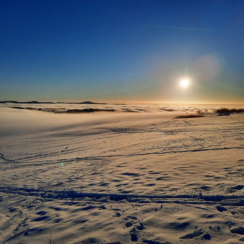 snow, winter, sky, ice, nature, landscape, cold, mountain, sea, white, water, clouds, view, frozen, cloud, ocean, aerial, travel, frost, snowy, outdoors, season, mountains, environment, weather sunset in the snow on top of winter mountain Rhoen Rhön Hesse Germanyphoto preview