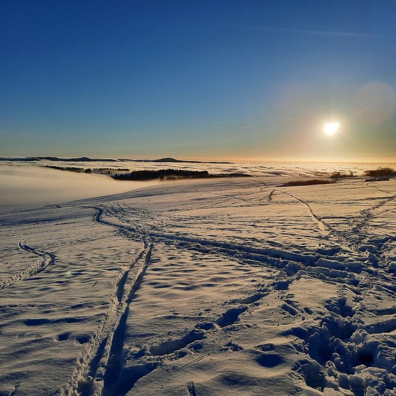snow, winter, sky, ice, nature, landscape, cold, mountain, sea, white, water, clouds, view, frozen, cloud, ocean, aerial, travel, frost, snowy, outdoors, season, mountains, environment, weather sunset in the snow and fog on top of winter mountain Rhoen Rhön Hesse Germanyphoto preview