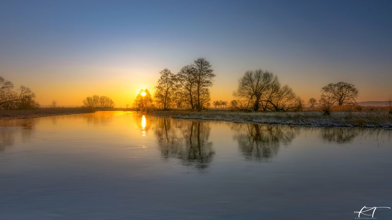 sunrise, , nature, , river, , gwda, , winter, 2022, , sun, , sky, , sunlight, , march, , trees, , landscape, , reflection, in, water, , no, people, , photography, , beauty, in, nature The Gwda River in the glow of the rising sunphoto preview