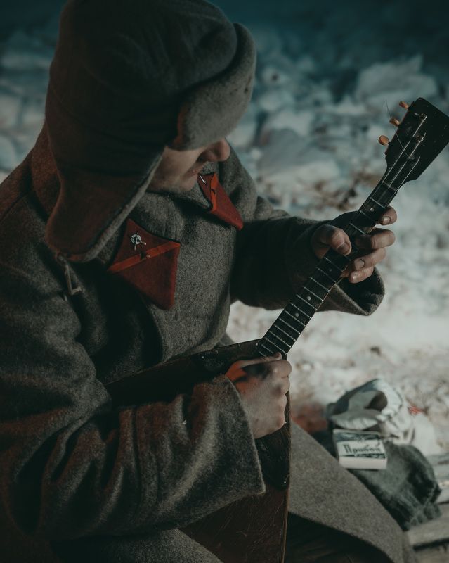 Soldier with balalaikaphoto preview