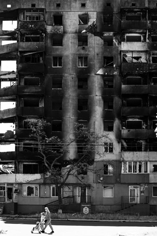 ukraine, war, russian, invasion, borodyanka, street, family, motherhood, children, walking, fire, destruction Life is goes onphoto preview
