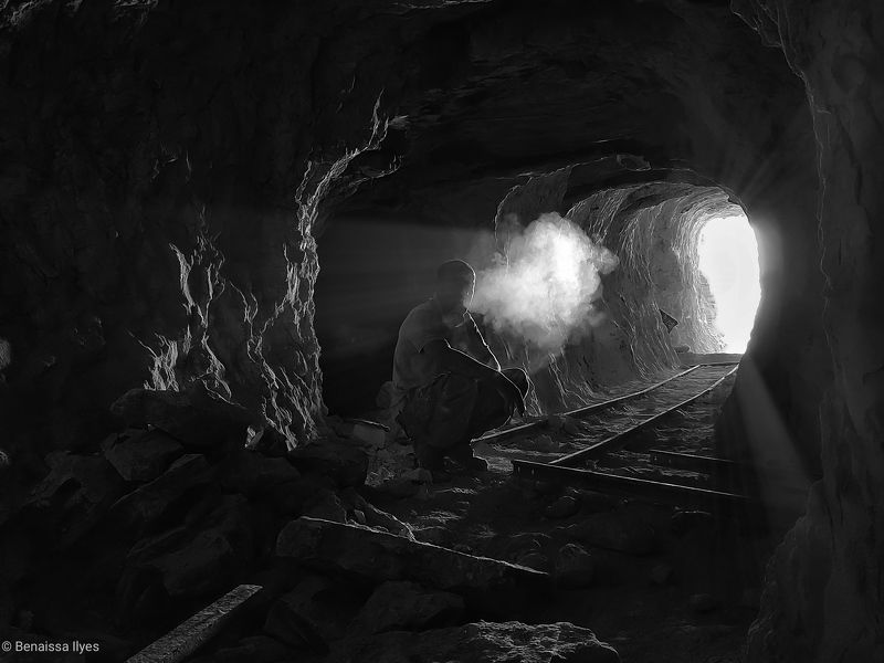 black and white, bnw, portrait, fine art, man, smok, in the middle Man in the cavephoto preview
