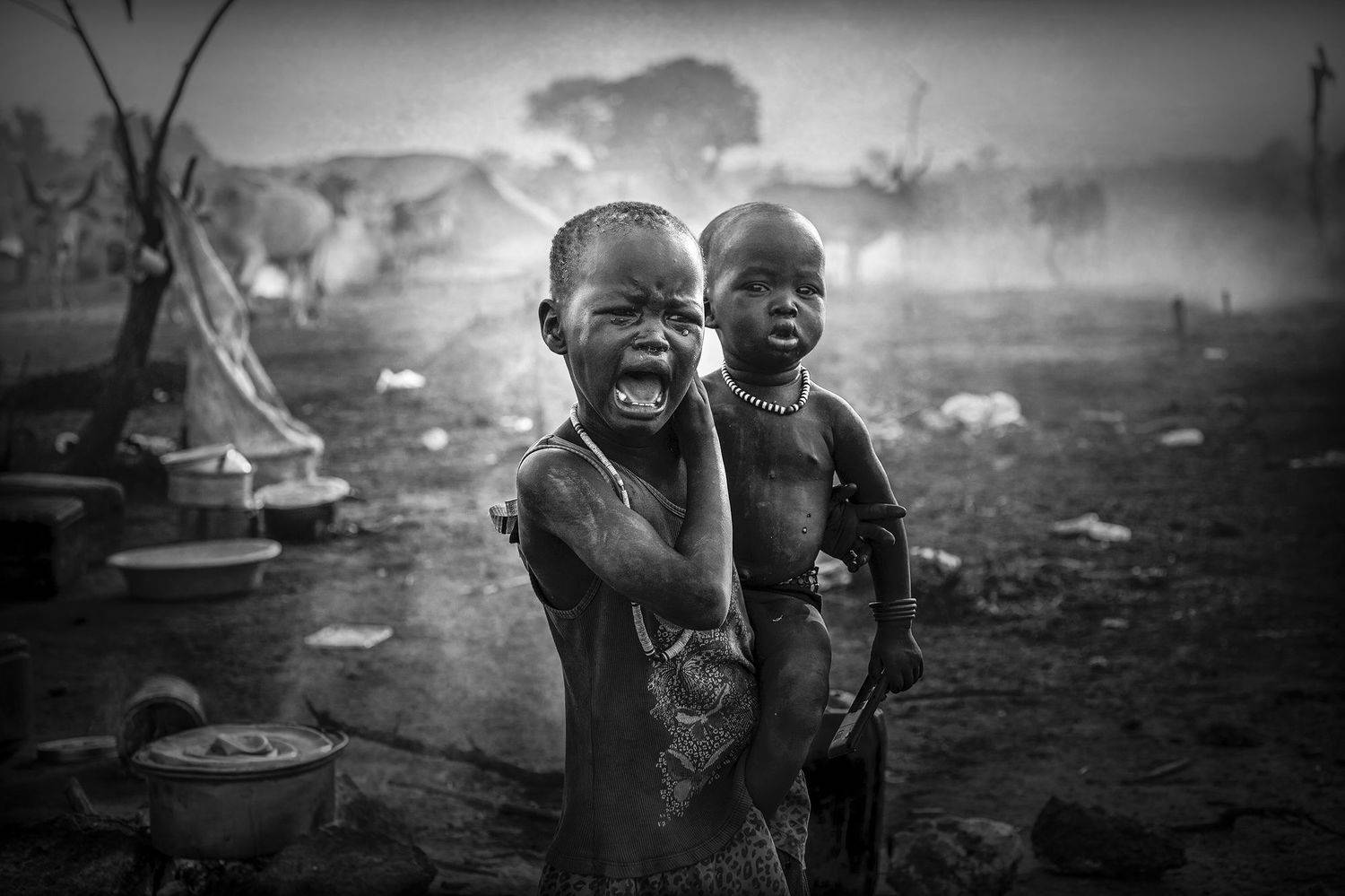 Crying child Mundari,South Sudan. Автор: Svetlin Yosifov child,people,children,kids,boy,kid,africa,person,people,urban,woman,light,low key,low-key,girl,dark,fog,shadow,mundari,dinka,southsudan,sudan,tribal,tribe,africa,afrika,horns,sunset,sunrise,war,cattle,animal,nature,horn,wild,horned,cow,rural,south_sudan,c, Svetlin Yosifov
