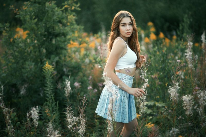 Girl among wildflowersphoto preview