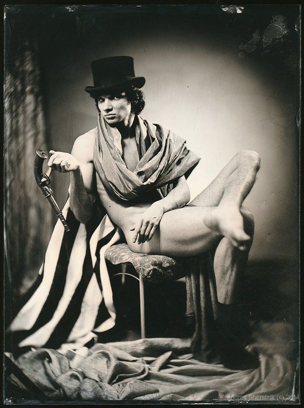 Portrait of a man in a single sock.photo preview