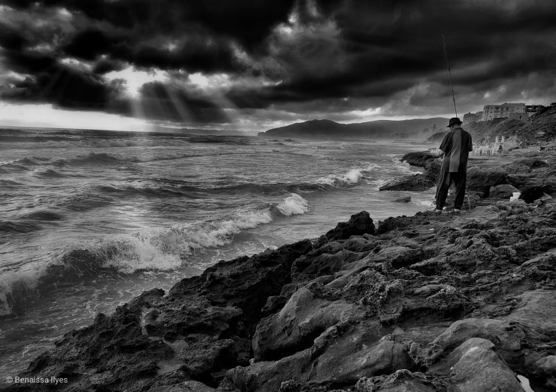 black and white, bnw, chair, film, fine, fishing , sea art, seascape, monochrome, cloudscape, sky, clouds, waves, dramatic, film Man fiching in seaphoto preview