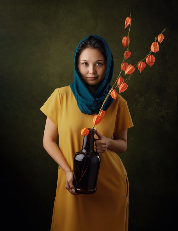 The girl with the physalis flowerphoto preview