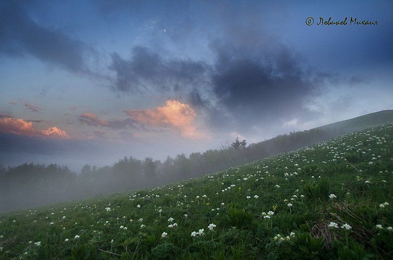 закат сквозь облакаphoto preview