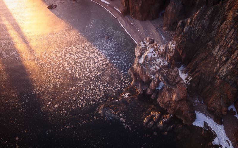 россия приморский край остров шкота арка трезубец закат свет весна пейзаж природа море льдины скалы Арка Трезубецphoto preview