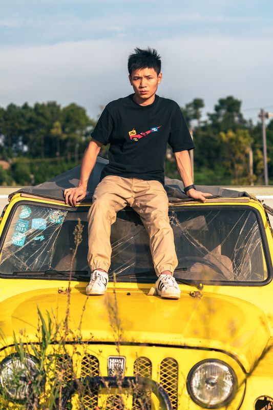 male, man portrait, man, yellow, abandoned, car, nature, trees, sky, china, chengdu, broken, old Adventurephoto preview