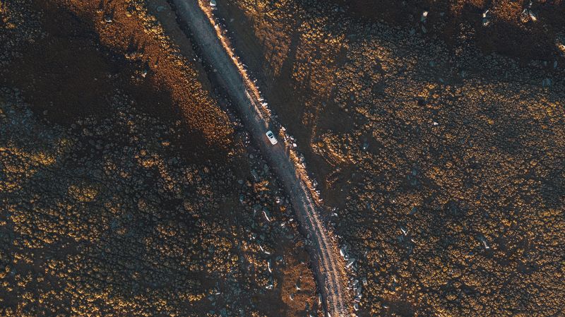 aerial, bird\\\'s eye view, plateau, nature, car, road, rocks, bushes, rusty, sunset, sunrise, golden hour, shadows Wonderlandphoto preview