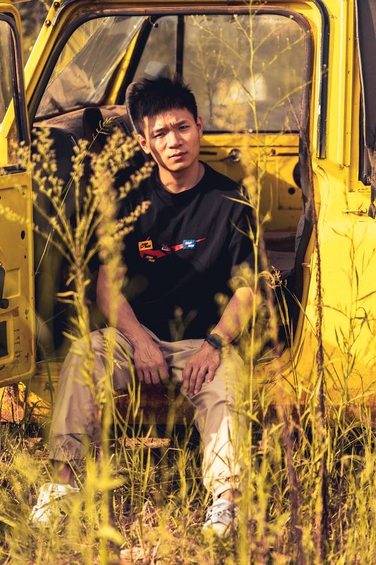 male, man portrait, man, yellow, abandoned, car, nature, trees, sky, china, chengdu, broken, old Adventurephoto preview
