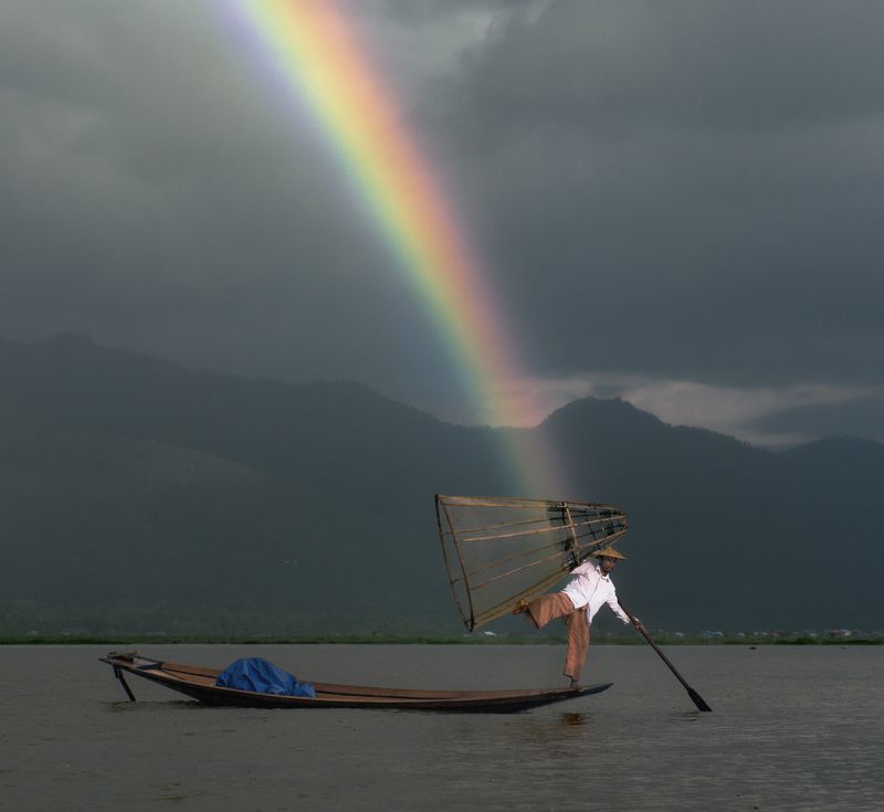fisherman making a rainbowphoto preview