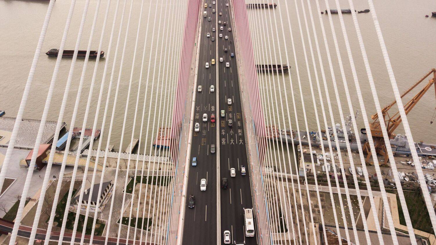 drone, bird's eye view, aerial, bridge, cars, cables, river, ships, crane, port,china, shanghai, Druz Denys