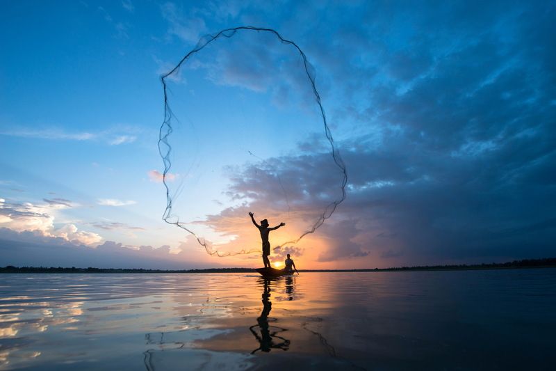 Fisherman, Fishing Net, Commercial Fishing Net, Fishing, Freshwater Fishing, Thailand, Throwing, Nautical Vessel, Nature, Motion, Adult, Adults Only, Cloud - Sky, Color Image, Dramatic Sky, Dusk, Holding, Horizontal, Only Men, Outdoors, People, Photograph Fishingphoto preview