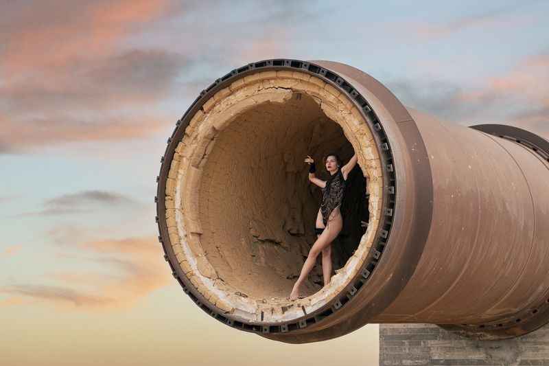 abandoned building, beautiful woman, clouds, dreaminess, elegance, female, grace, individuality, lifestyles, lingerie, looking, makhtesh ramon, one person, outdoors, pipe, sensuality, side view, skies, standing, sunrise, underwear, young women Exit Westphoto preview