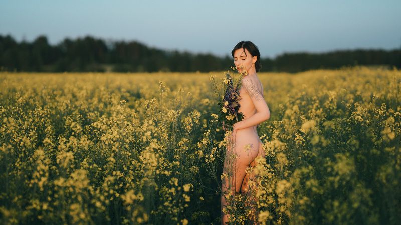 In the embrace of flowersphoto preview