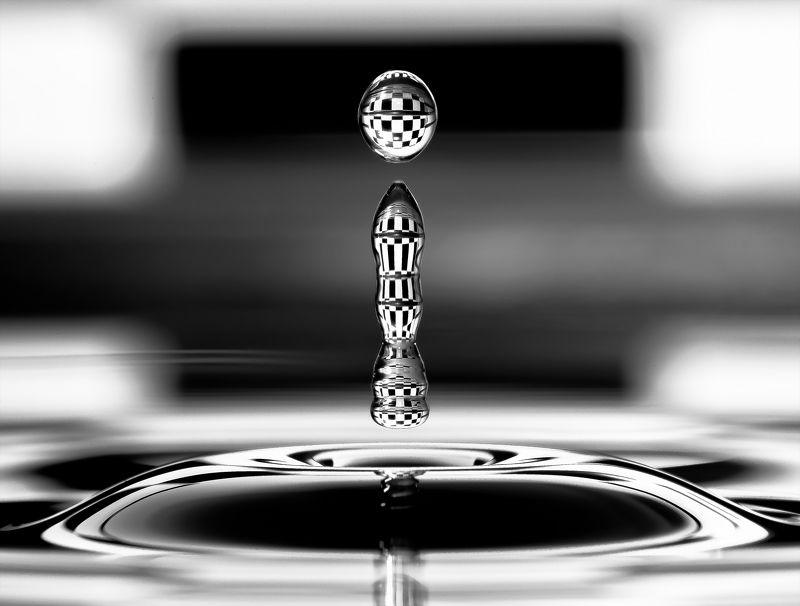 Bullet shaped drop of waterphoto preview