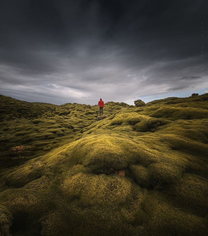 iceland, sunset, landscape, sky, sun, lavafield, mountains, panorama, mosssy, green, clouds, rocks Red Jacket at the Mossy Fieldphoto preview