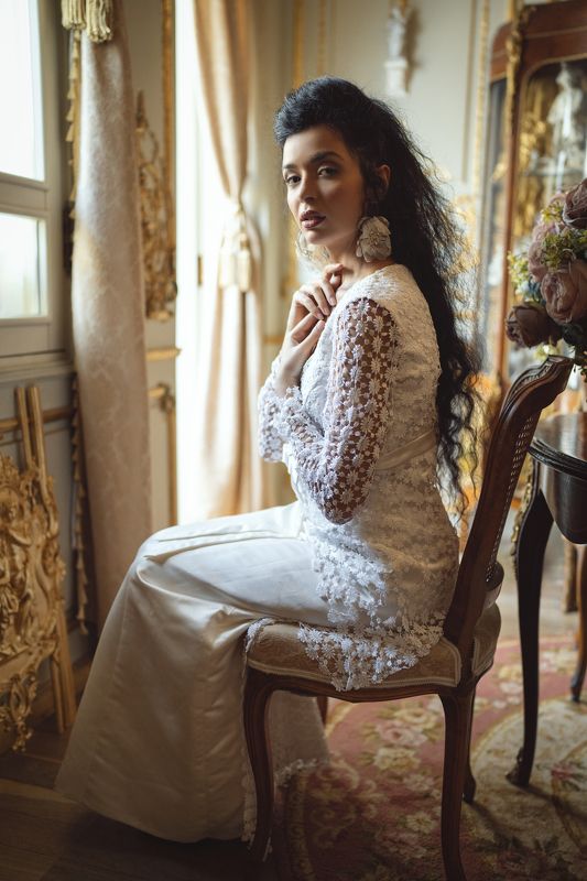 ball gown, beautiful woman, carpet, chair, earrings, elegance, fashion, femininity, flowers, grace, human face, indoors, lifestyles, looking at camera, louis XV, one person, portrait, retro, rococo, sensuality, side view, sitting, table, vintage, windows Charm of the Boudoir фото превью