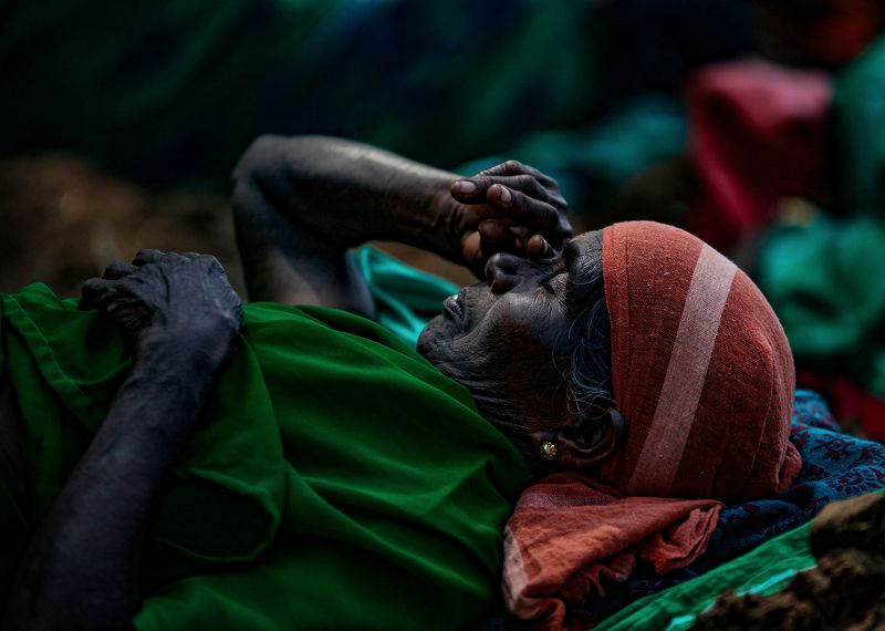 #woman #india #worker  #travel #street A Worker woman rest beside the farmlandphoto preview