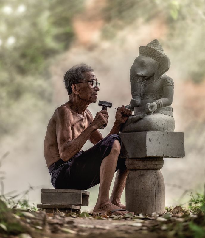 stone; tool; cambodia; chisel; hand; carver; worker; artistic; made; craftsman; decoration; activity; sculpture; oriental; carpentry; craft; construct; carving; sharp; brown; shaving; sand; handmade; chip; skill; traditional; asia; equipment; handwork; pi Stone carverphoto preview