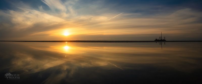 sea,beach,sunset,panorama,panoramic,landscape,sky,clouds,setting sun. shoreline Baltic Sunsetphoto preview