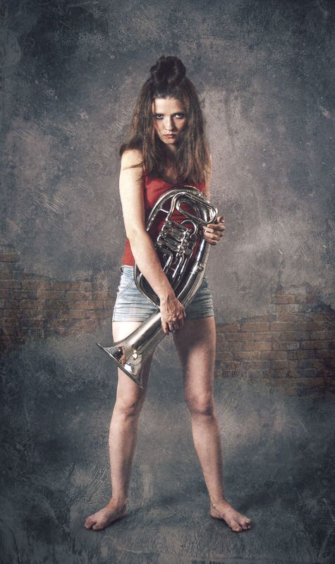 Девушка с трубойphoto preview