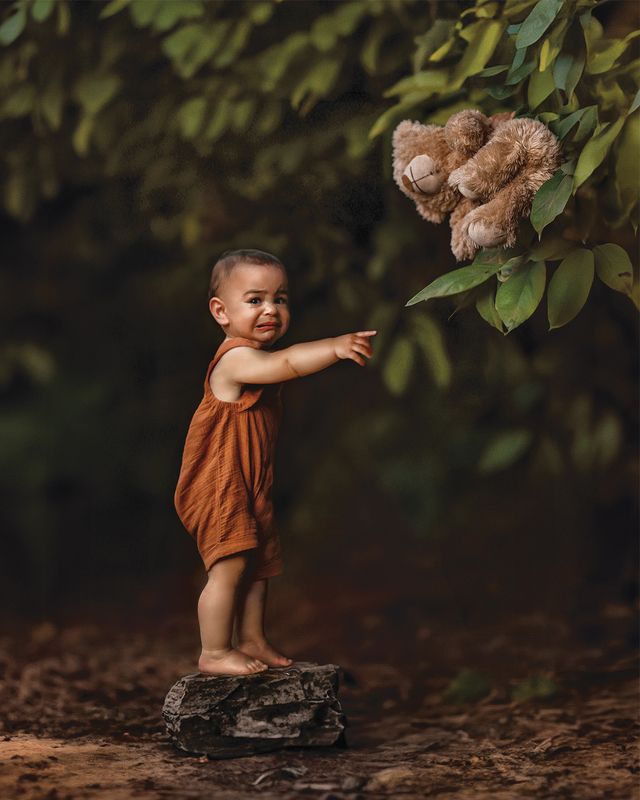 A baby and a bearphoto preview