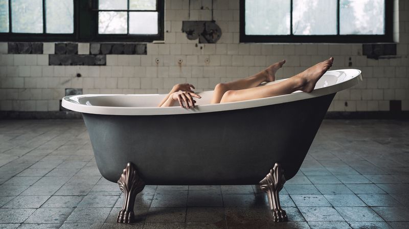 abandoned building, bath, creative, fantasy, femininity, hands, individuality, indoors, legs, lifestyles, lying down, one person, pair, pose, relaxation, side view, studio shot, two, windows, young woman The Art of Concealmentphoto preview