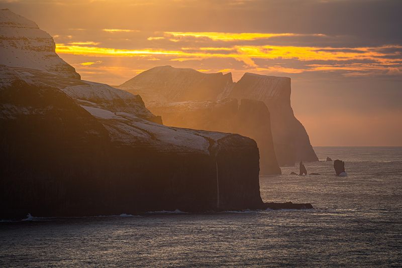 landscape, nature, scenery, sunset, sea, rocks, coast, island, еvening, пейзаж, faroe The Risin and Kellingin sea-stacks as seen from Kallur lighthouse, Faroe islandsphoto preview