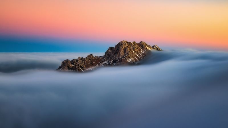 In the embrace of the cloudsphoto preview