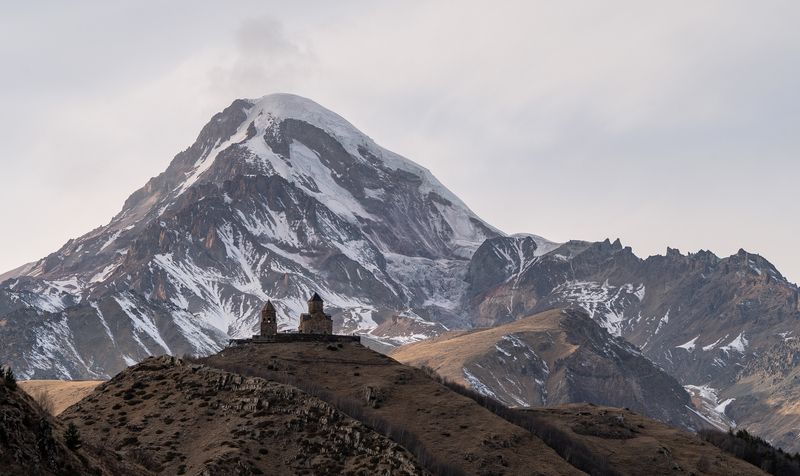Грузия, Казбеги, Степанцминда, Троицкая церковь в Гергети, Gergeti Trinity Church, гора Казбек Грузияphoto preview